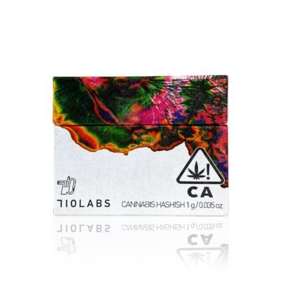 Experience a true clash of cannabis titans with 710 Labs GG4 + GMO Live Rosin Badder (1G). This hybrid blend brings together two of the most beloved funk-forward strains in modern cannabis—the sticky, diesel-soaked euphoria of GG4 (Original Glue) and the savory, garlic-mushroom pungency of GMO—into a single, solventless concentrate that delivers the best of both worlds . Crafted with 710 Labs' obsessive focus on terpene richness and clean extraction, this Live Rosin Badder offers a stable, easy-to-work "cold cure" consistency. After the rosin is pressed, it's sealed and left to cure at room temperature, forming an opaque, badder-like texture with minimal terpene degradation . This means every dab delivers full-spectrum flavor and potency without the harshness of solvents. The flavor profile is a complex journey. GG4 contributes its signature earthy pine, sour diesel, and chemical funk, while GMO layers in savory garlic, mushroom, and onion notes inherited from its Chemdawg lineage . The result is a rich, pungent dab experience that true concentrate connoisseurs will appreciate—gassy, earthy, and deeply satisfying. The effects are famously balanced and full-bodied. GG4 is known for strong euphoria that settles into deep body relaxation, while GMO adds a euphoric lift before transitioning into heavy sedation . Together, they deliver an elevated, full-bodied, and balanced experience that's perfect for evening unwinding, stress relief, or simply enjoying a premium solventless session . Key Features: Strain: GG4 + GMO (Hybrid Blend) Format: Live Rosin Badder (Cold Cure) Size: 1 Gram Flavor Profile: Earthy Pine, Sour Diesel, Chemical Funk, Garlic, Mushroom, Pungent Effects: Relaxed, Euphoric, Happy, Sleepy, Full-Bodied Quality: Solventless, Full-Spectrum, Small-Batch, Lab-Tested Why Choose 710 Labs? 710 Labs is a company dominated by award-winning artists obsessed with making the richest flavored, pesticide-free, organically fed, small-batch, hand-trimmed cannabis on the planet . Their Live Rosin Badder represents the pinnacle of solventless craftsmanship—clean, potent, and terpene-rich.